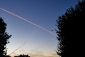 Rose ce matin la traînée de l'avion